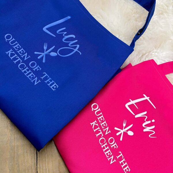 Queen Of The Kitchen Aprons in Pink and Blue - Close Up