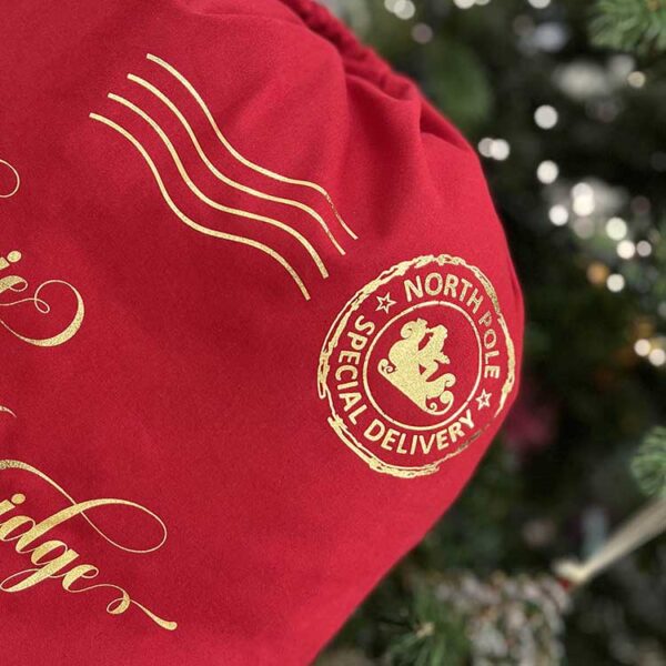 Christmas Delivery Gift Sack in Red and Gold Close Up