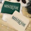 Adults Christmas Jumpers - Meet Me Under The Mistletoe in Green and Vanilla